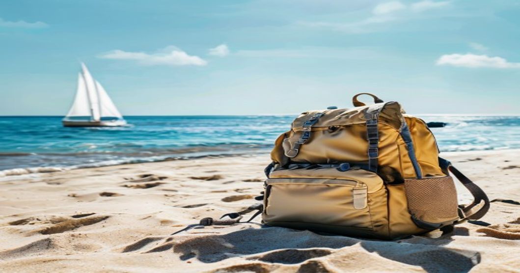 Best travel backpack with removable day pack for beach trips and snorkeling storage laid out on beach sand